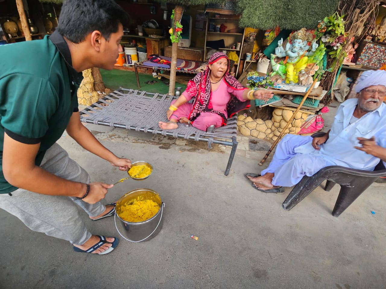 HELPS Foundation distributed ramroti meals in the sweltering summer heat