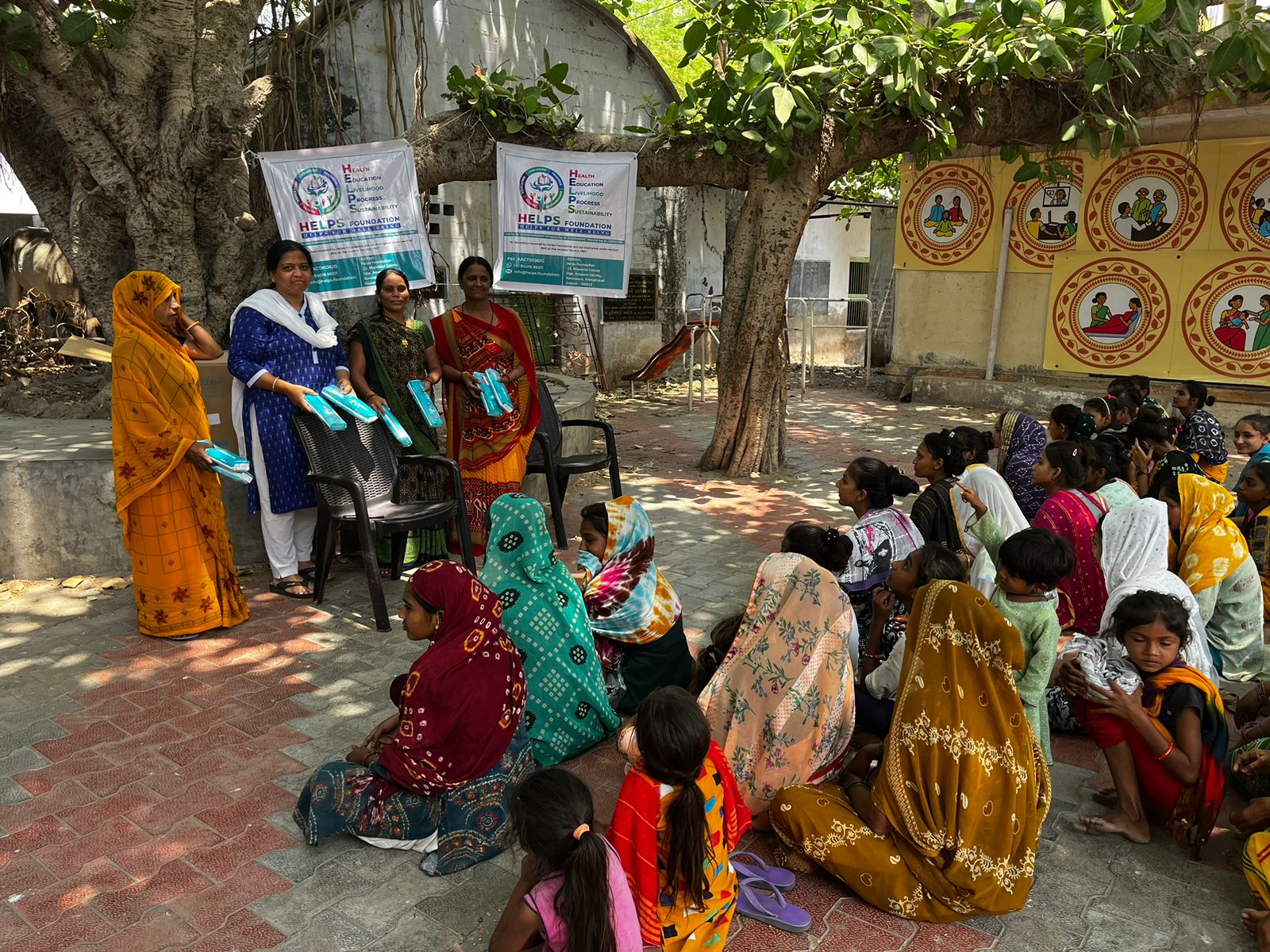Distribution of sanitary pads at Ambala village by - NGO Helps Foundation